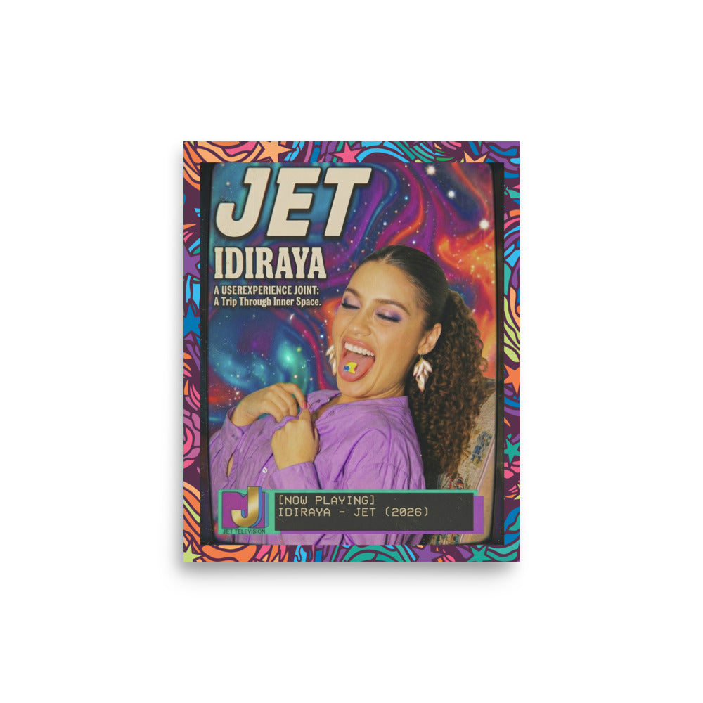 IDIRAYA poses joyfully with eyes closed and tongue out, showing a small colorful square on her tongue, wearing a purple top and gold leaf earrings against a vibrant cosmic swirl background. Bold retro text reads "JET" and "IDIRAYA" with tagline "A USEREXPERIENCE JOINT: A Trip Through Inner Space." A "JET TELEVISION" now-playing bar at bottom displays "IDIRAYA - JET (2026)." Framed with a vintage CRT screen border.